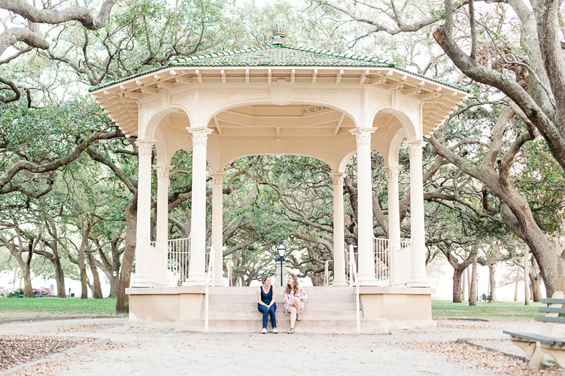 Sisters laughing at White Point Gardens gazebo in Charleston, South Carolina by Kaitlin Scott Photography