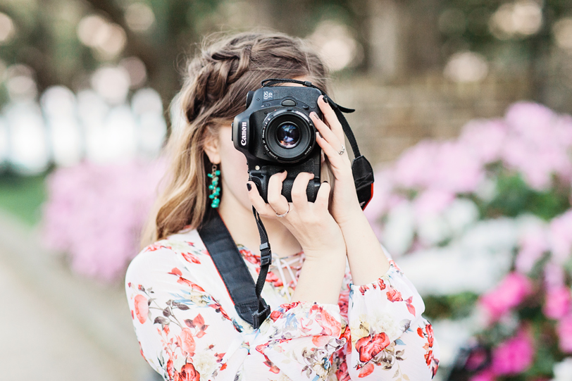 Girl, camera and azaleas in White Point Gardens by Charleston Photographer