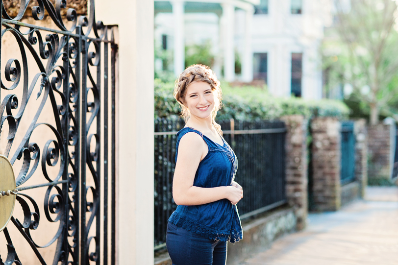 Portrait of a girl in Charleston, South Carolina by iron gate