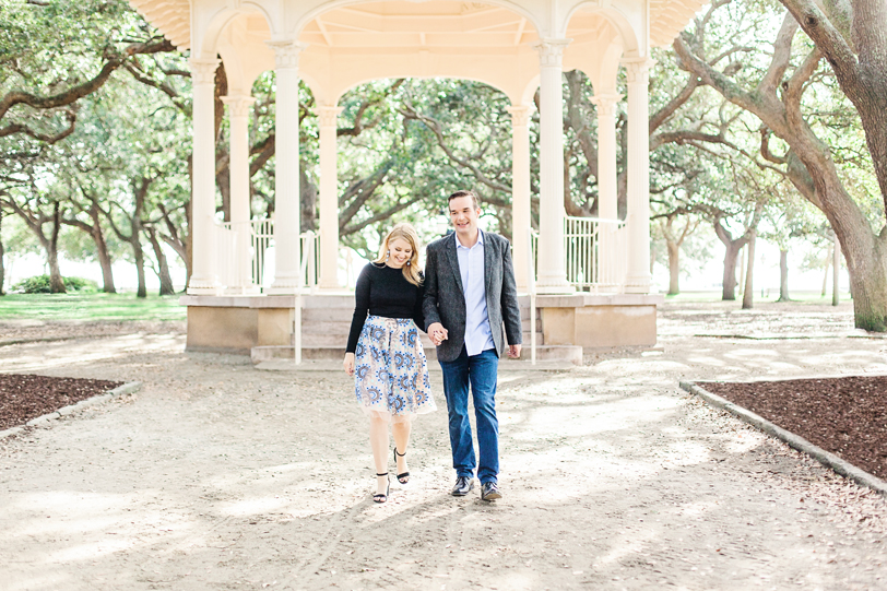 Couple holding hands in White Point Gardens by SC Engagement Photographer