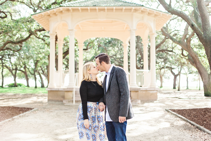 Cute couple kissing in front of gazebo in White Point Gardens by Kaitlin Scott Photography