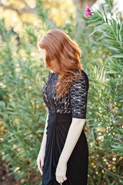 Portrait of a redhead in lacy black dress in Charleston, SC by Kaitlin Scott Photography