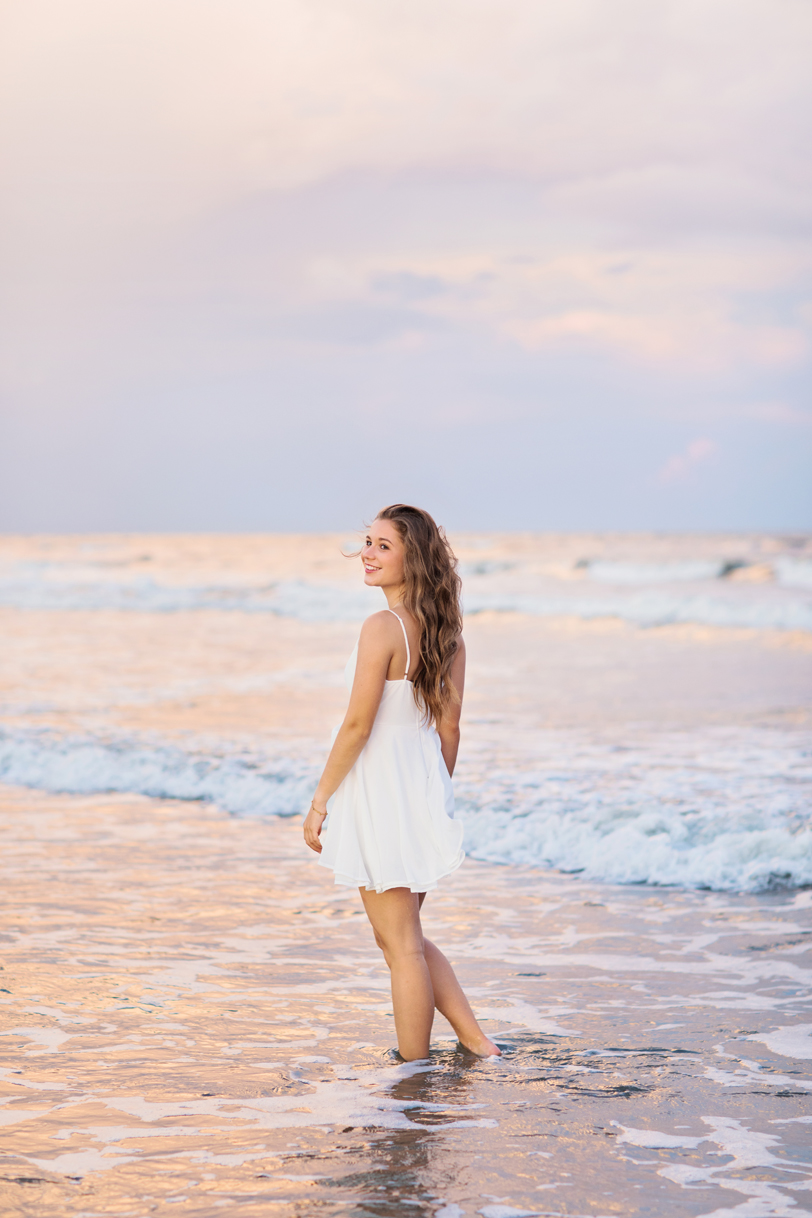 Girl standing in Ocean