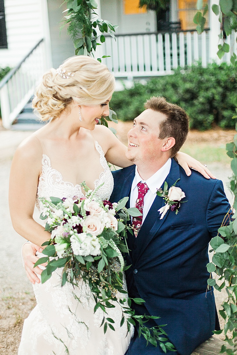 Romantic Bride and Groom Portraits at Wingate Plantation on swing | Kaitlin Scott Photography