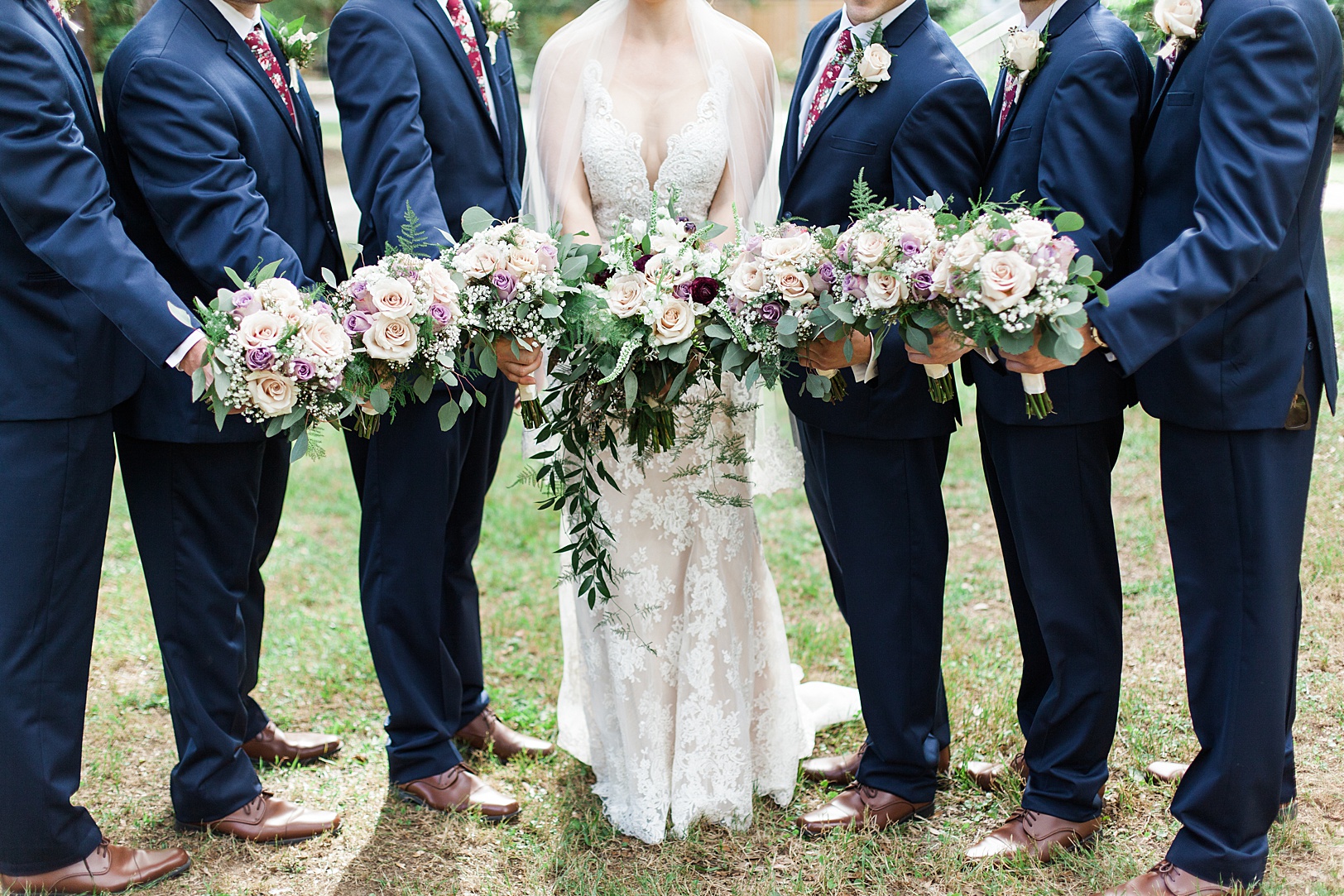 Bride with Groomsmen holding Bouquets | Kaitlin Scott Photography