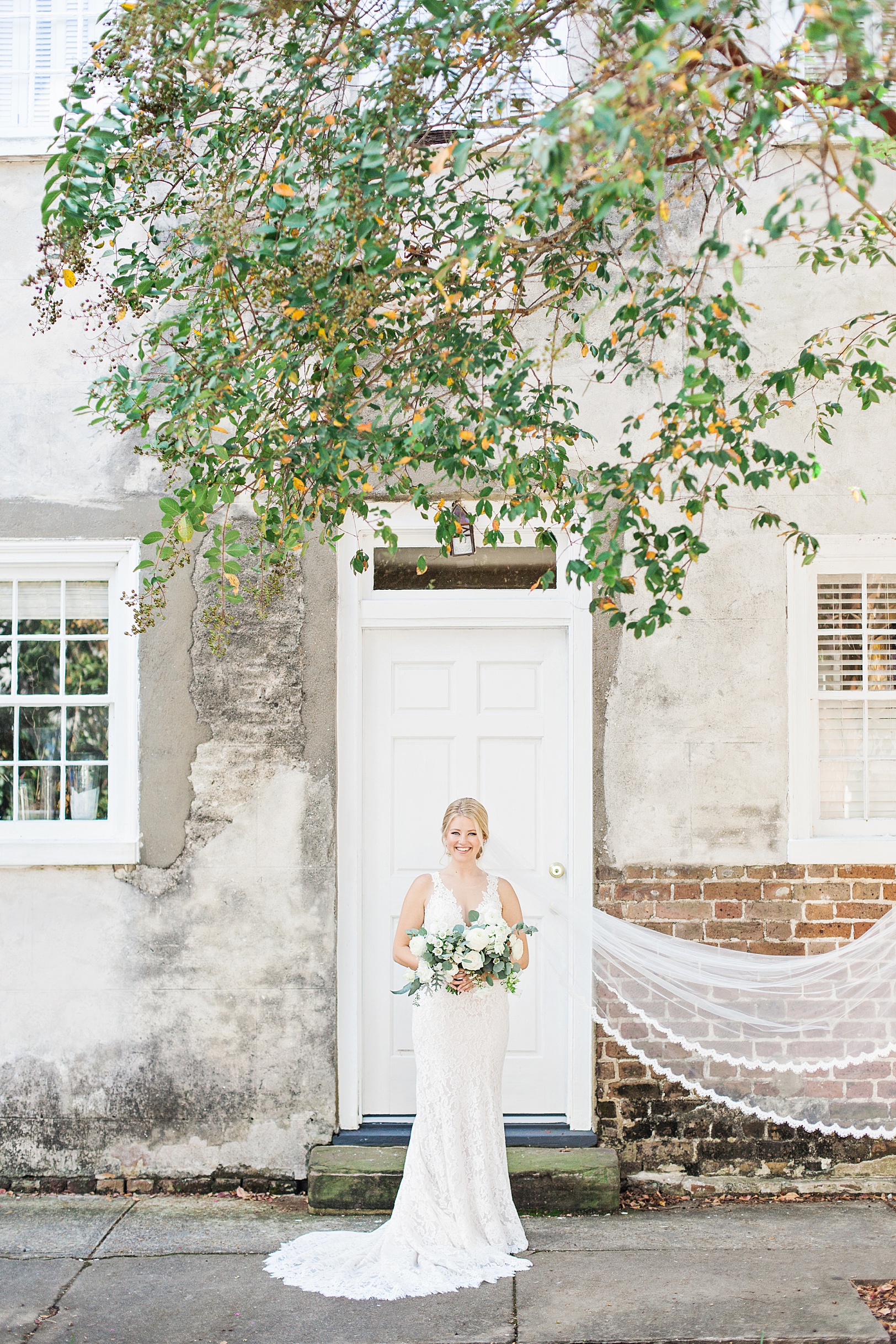 Charleston Bride with Veil on Historic Chalmers Street by Kaitlin Scott Photography