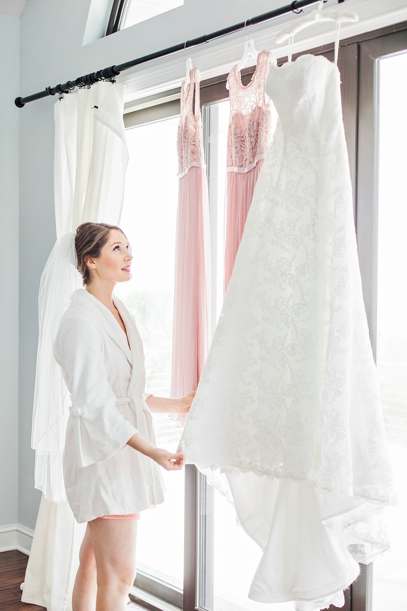 Bride Looking at Wedding Dress before Wedding | Kaitlin Scott Photography