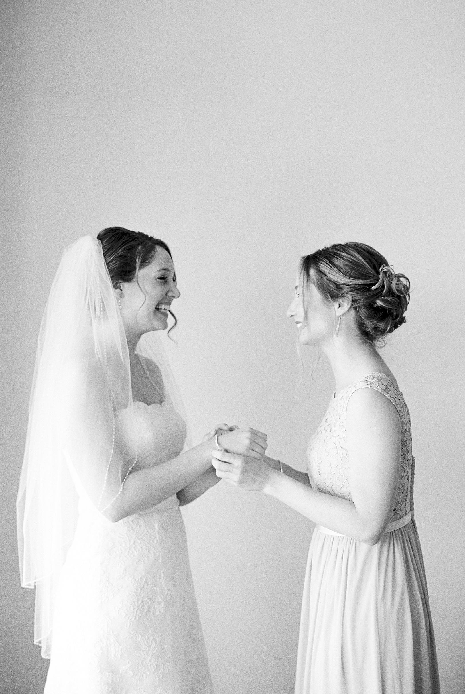 Black and White of Laughing Sisters on Wedding Day | Kaitlin Scott Photography