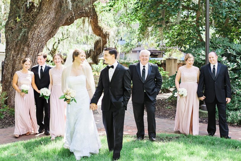 Bride and Groom walking with Wedding Party by Spanish Moss | Kaitlin Scott Photography