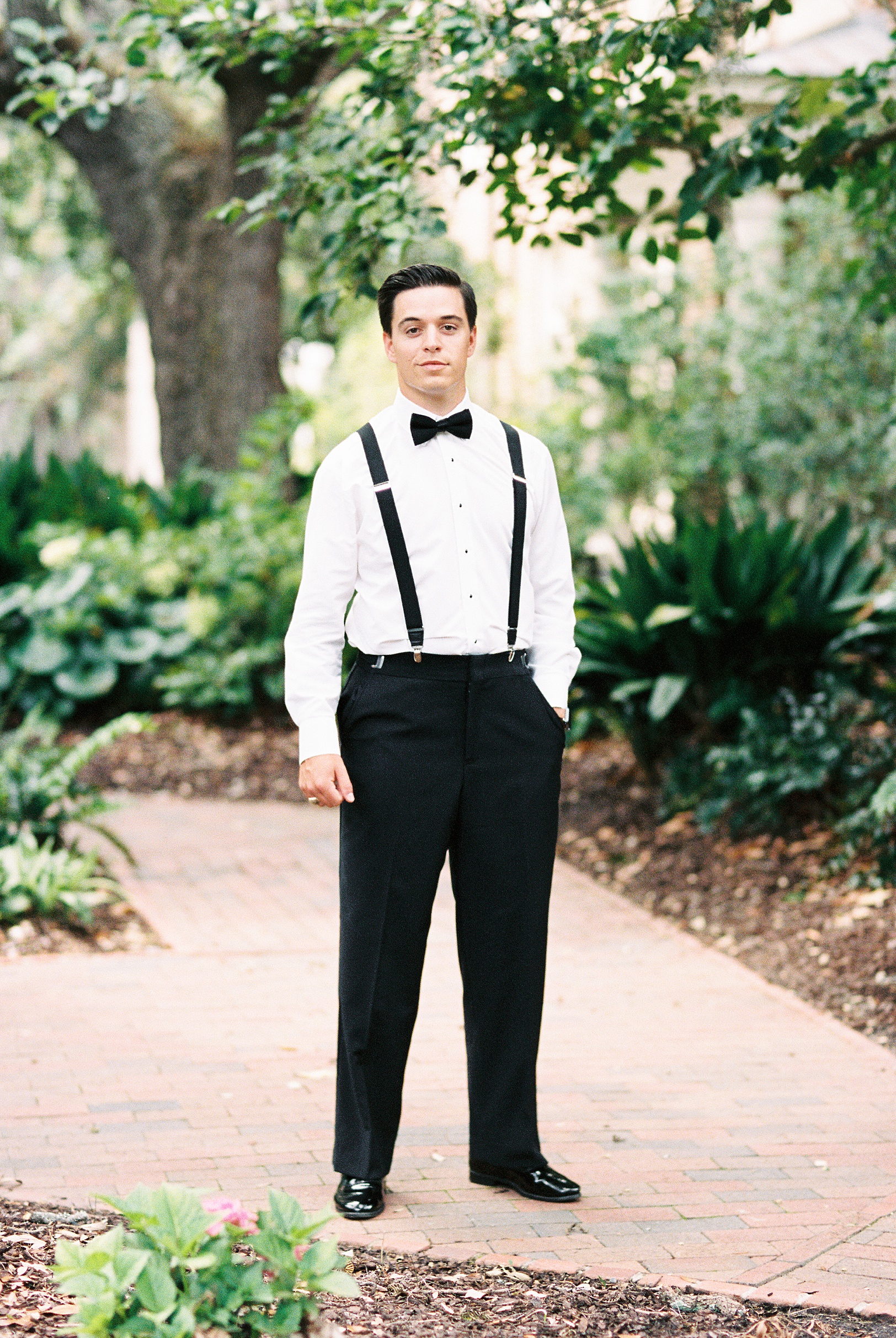 Film Wedding Photography Portrait of Charleston Groom with suspenders | Kaitlin Scott Photography