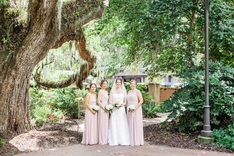 Charleston Bride and Bridesmaids at St. Luke's Wedding Chapel under Spanish Moss | Kaitlin Scott Photography