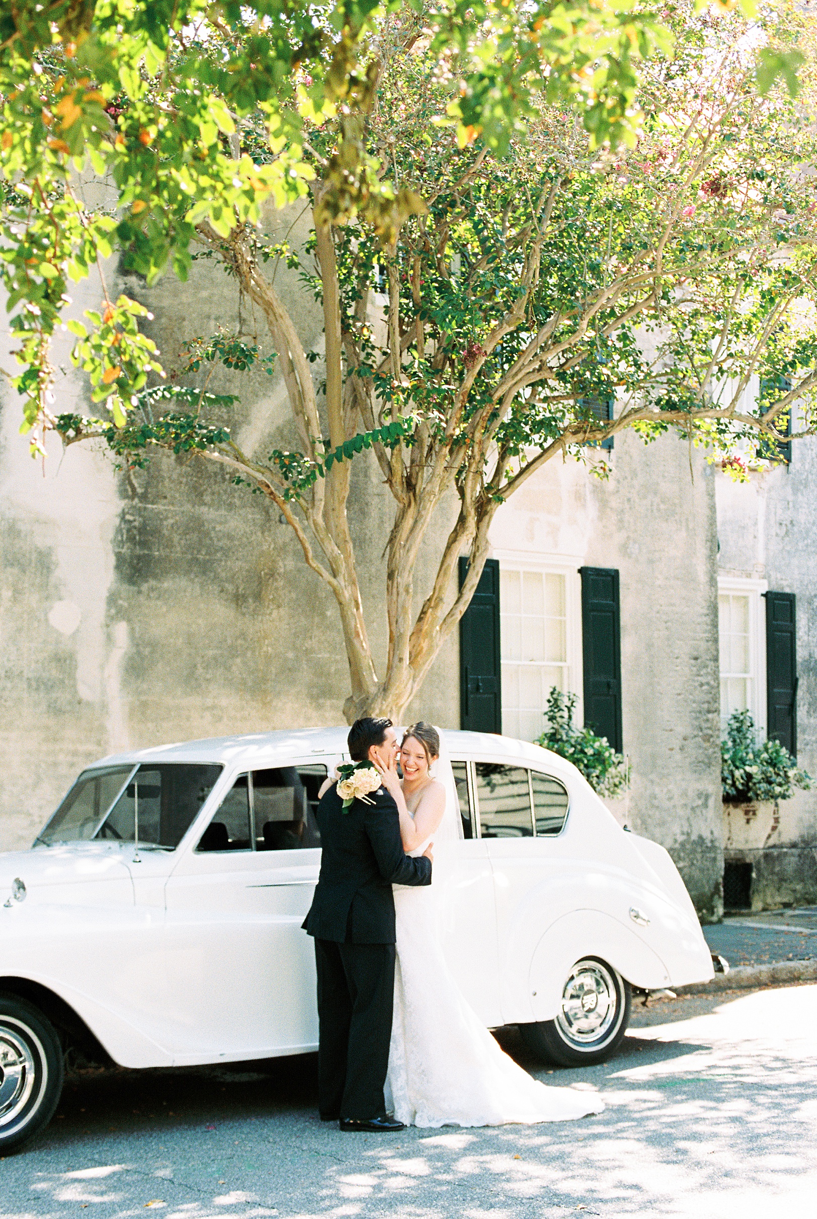 Groom whispering into Bride's ear in Charleston | Kaitlin Scott Photography