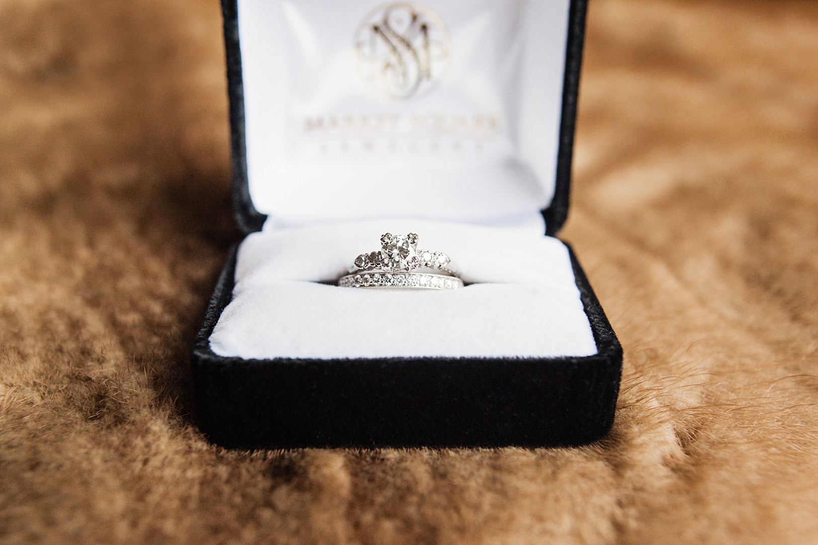 Engagement and Wedding Rings in box on fur | Kaitlin Scott Photography