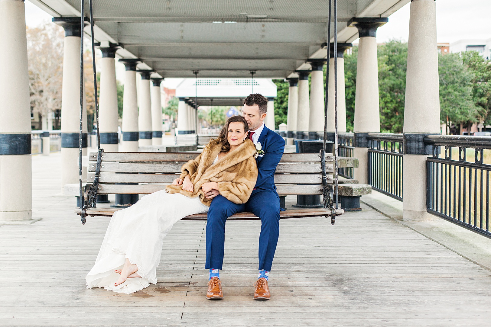 Sweet Bride and Groom Portraits at Waterfront Park's swings | Charleston Wedding Photographer Kaitlin Scott