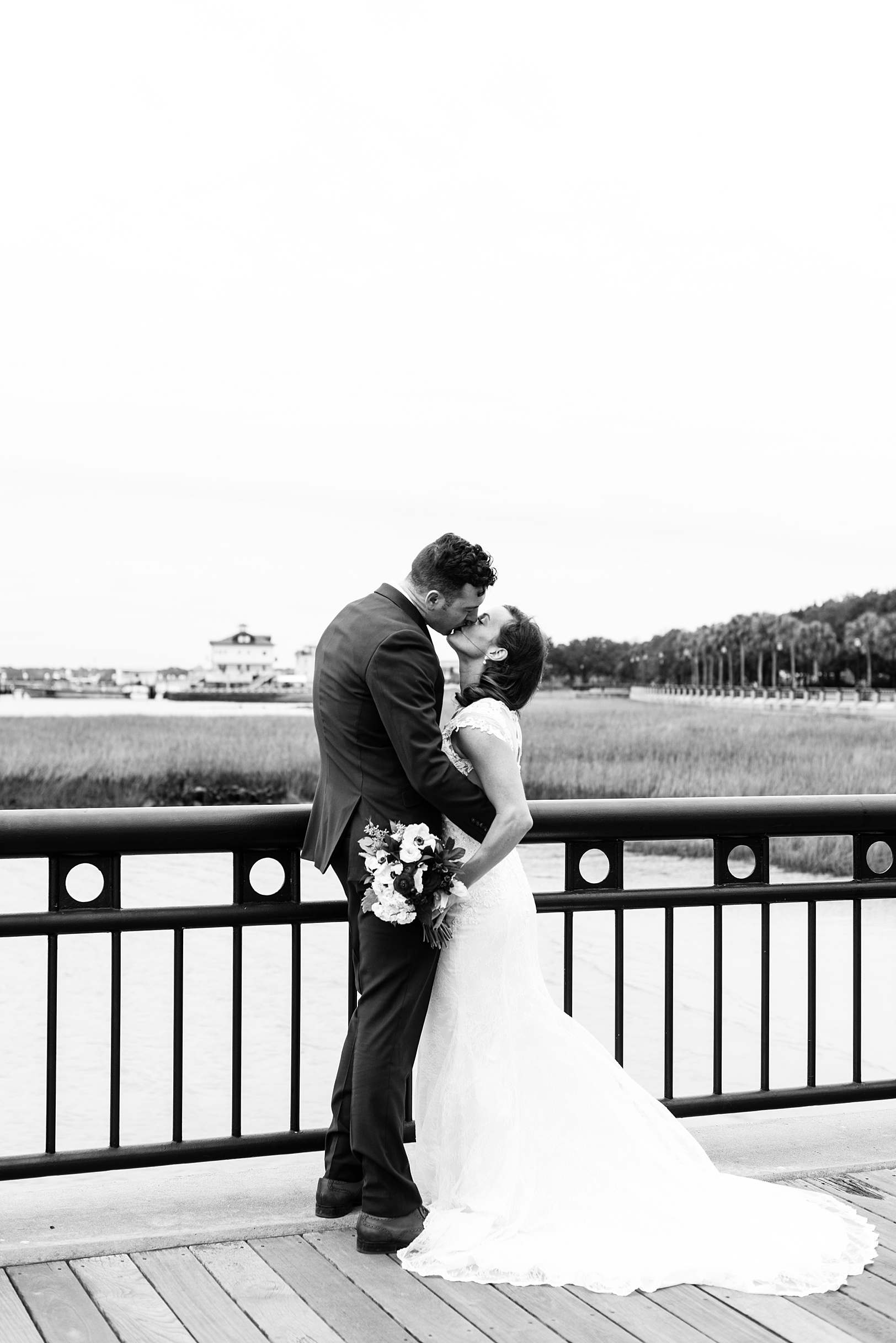 BW Bride and Groom kiss at Waterfront Park | Kaitlin Scott Photography