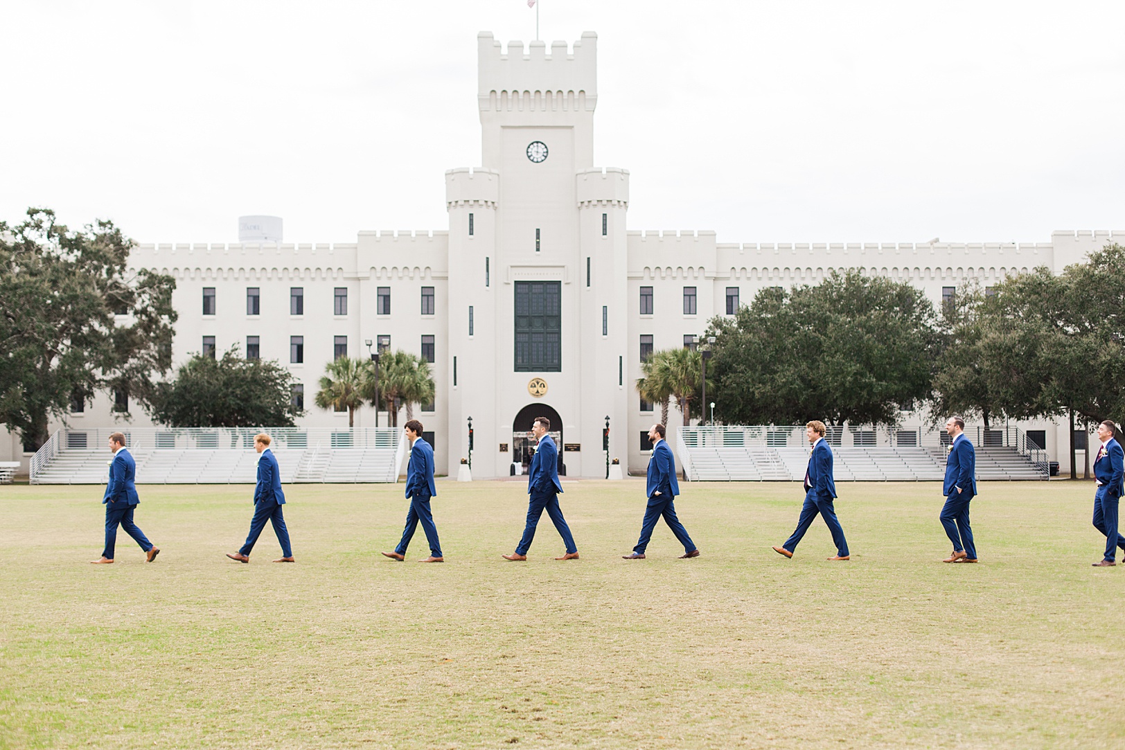 Groomsmen walking at Charleston Citadel | Kaitlin Scott Photography