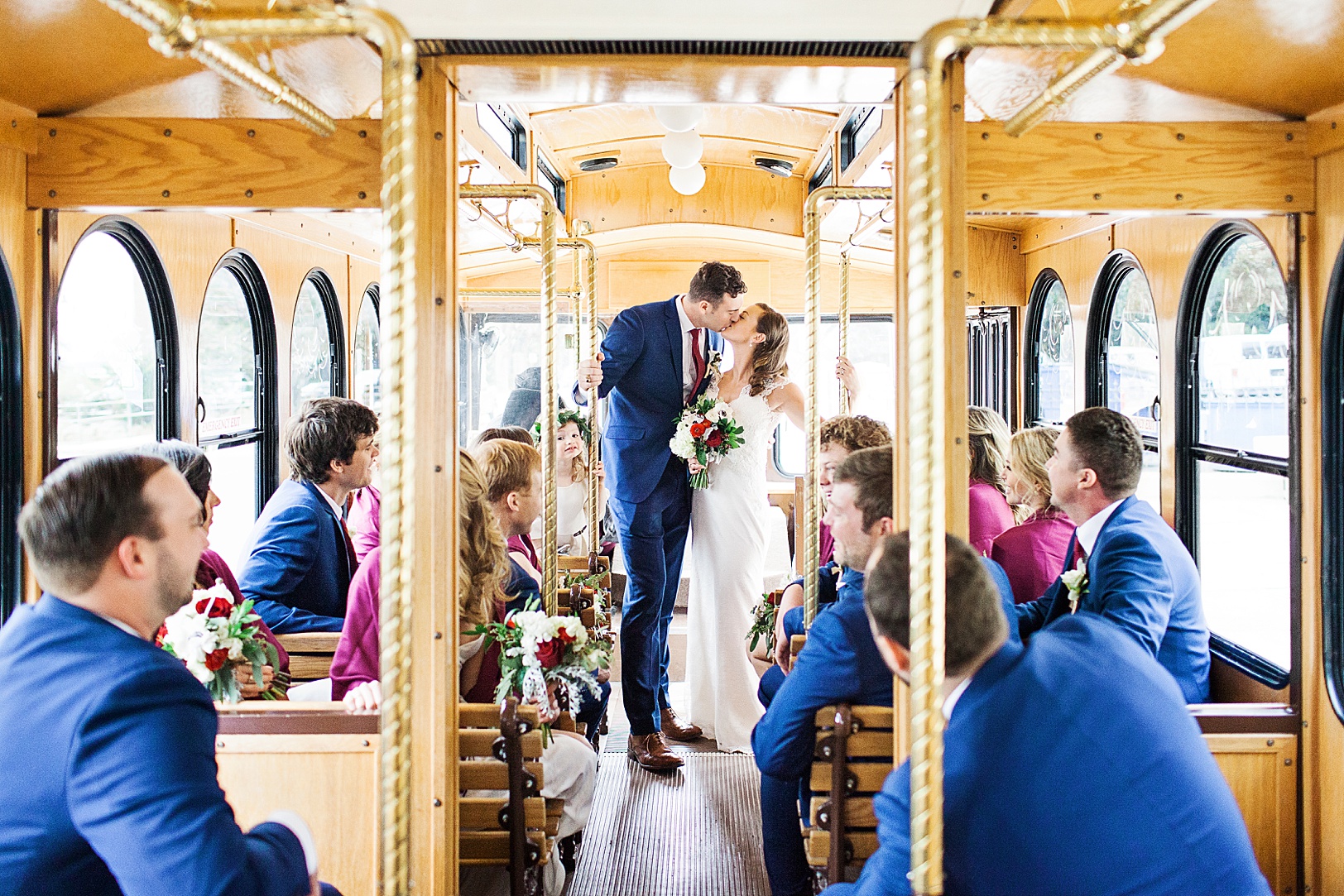Charleston Newlyweds kiss on Lowcountry Trolley | Kaitlin Scott Photography
