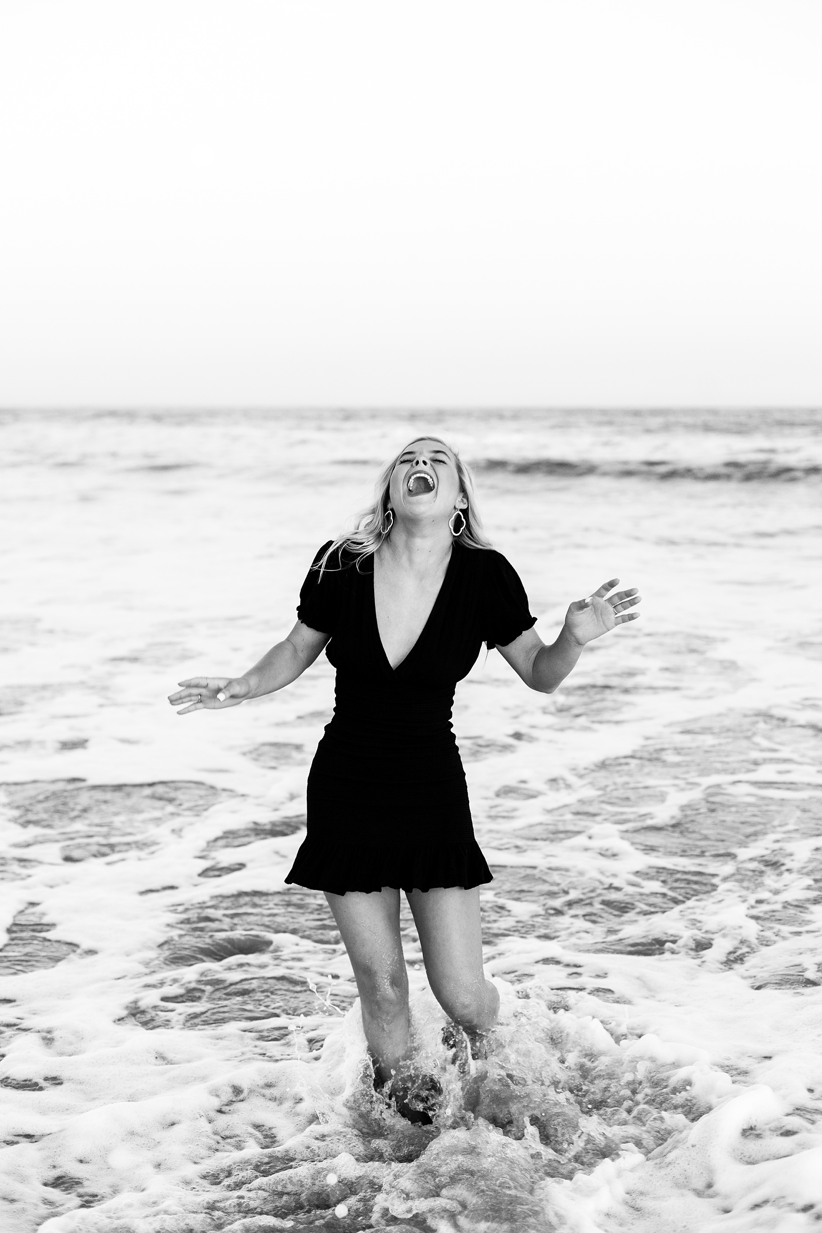 Laughing High School Senior at Charleston Beach | Kaitlin Scott Photography