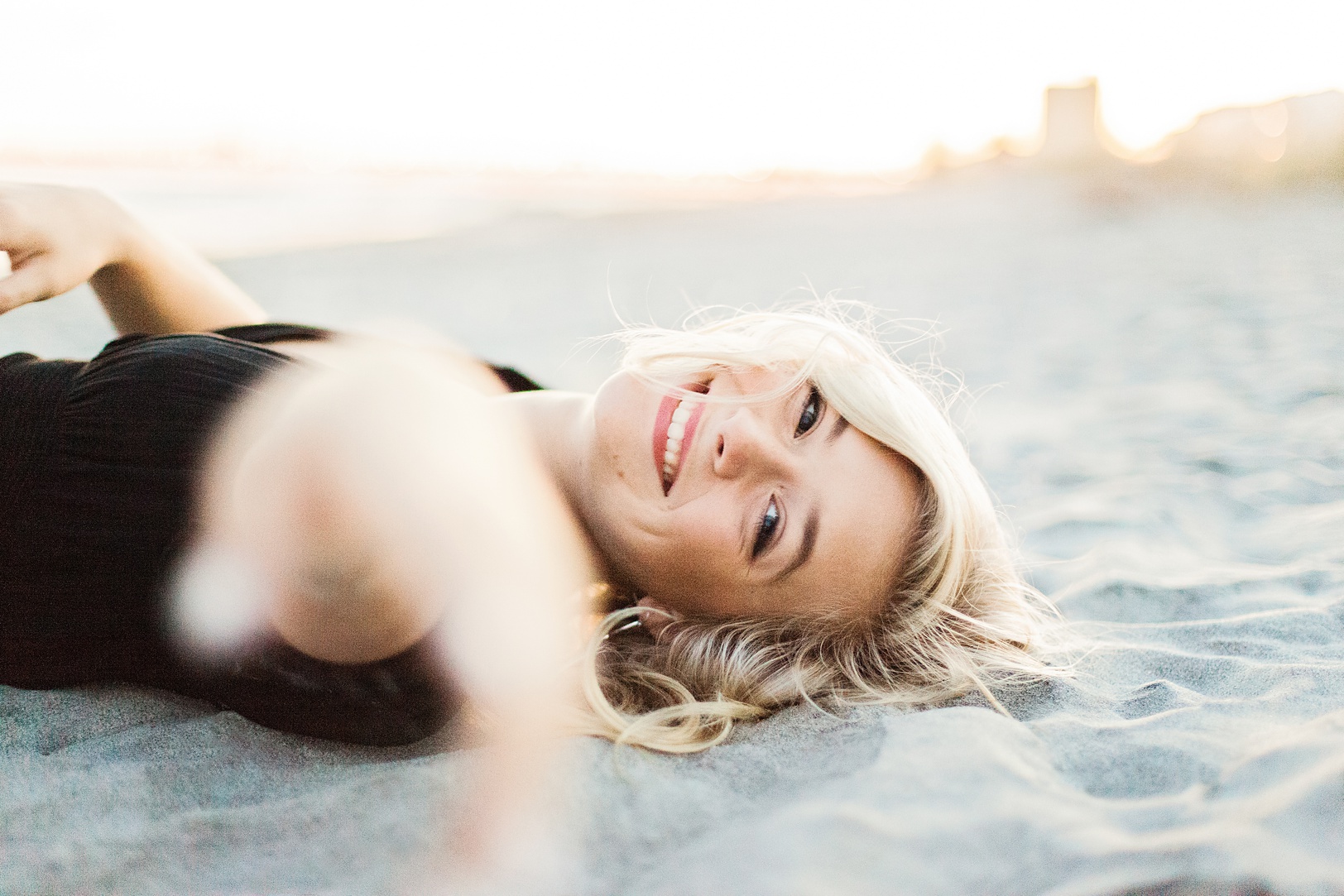 Senior Posing at the Beach in the sand | Kaitlin Scott Photography