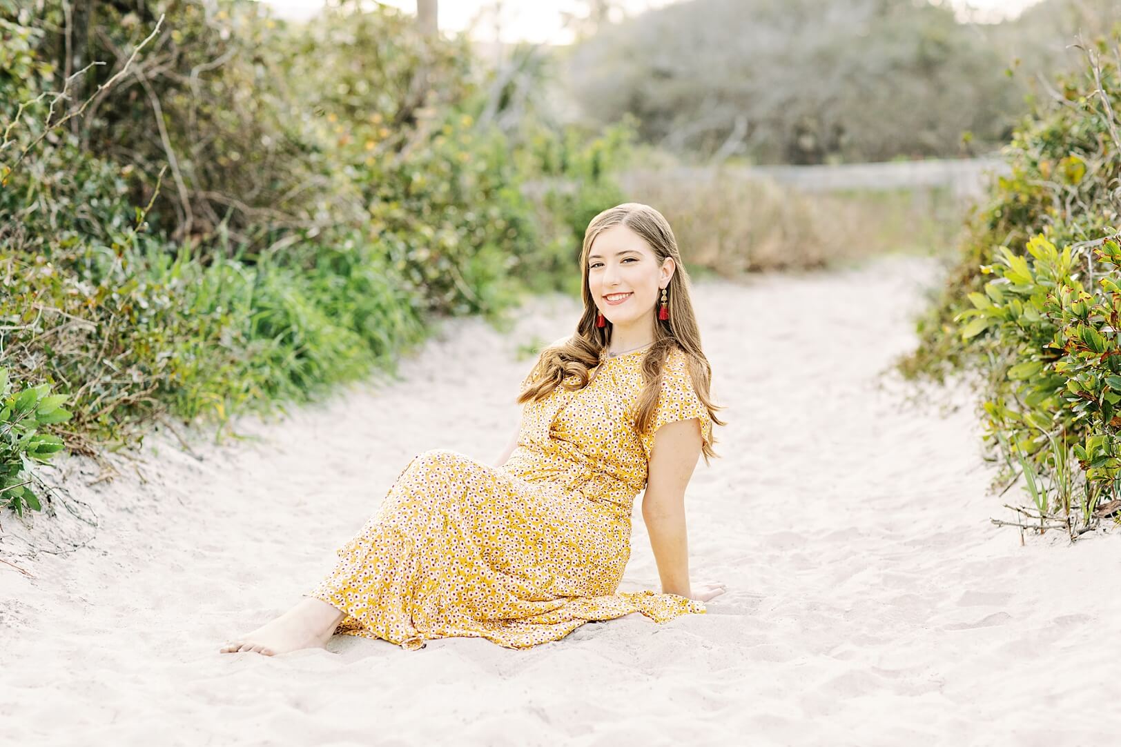 Girl in yellow dress at the beach 