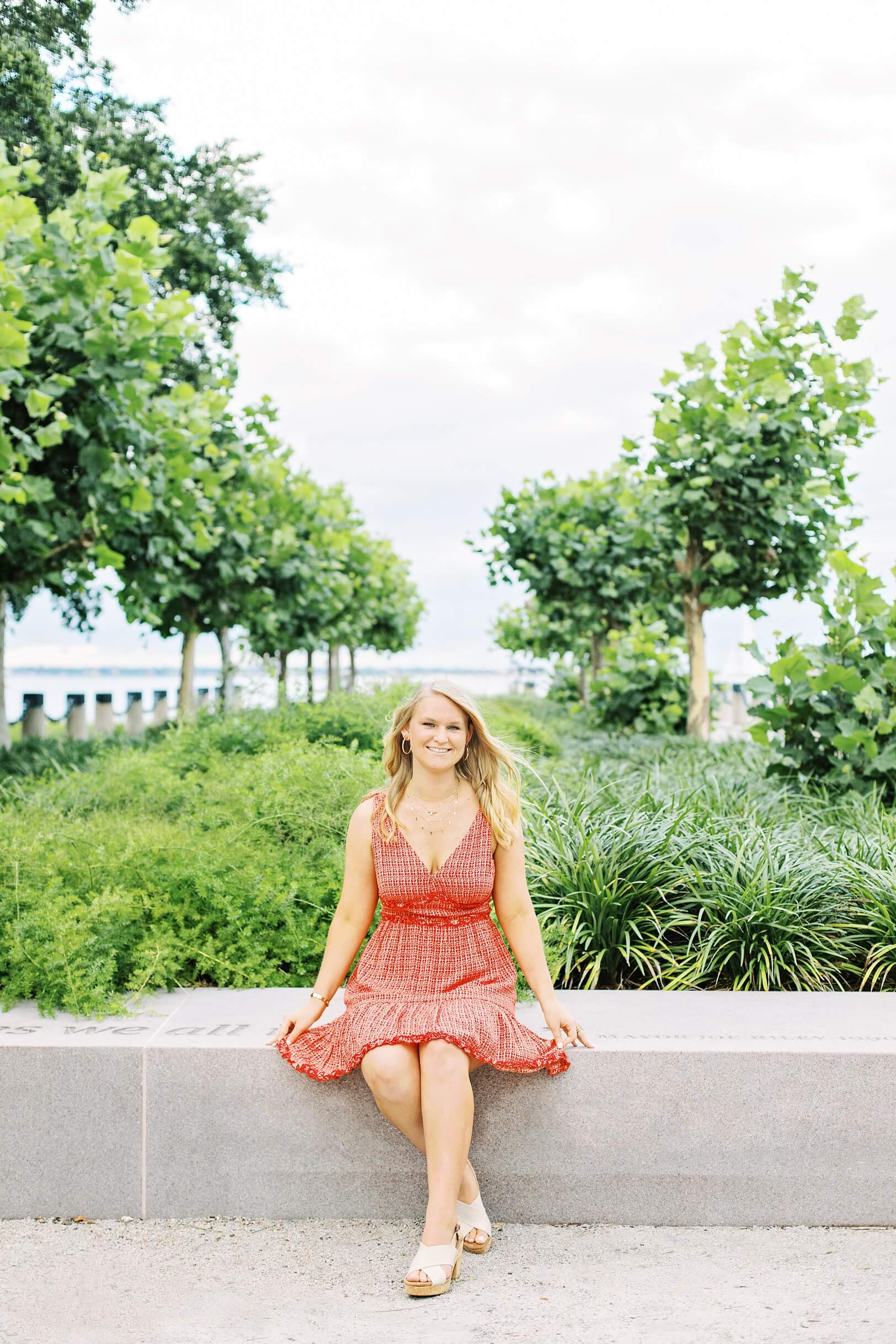 High school senior in red dress at Waterfront Park