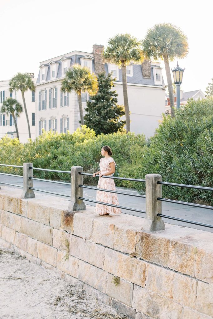 Charleston Battery Senior Girl stands looking out over water | Kaitlin Scott Photography