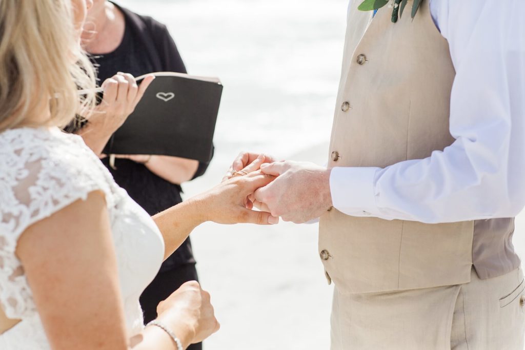 Groom putting ring on Bride in Elopement Ceremony | Kaitlin Scott Photography