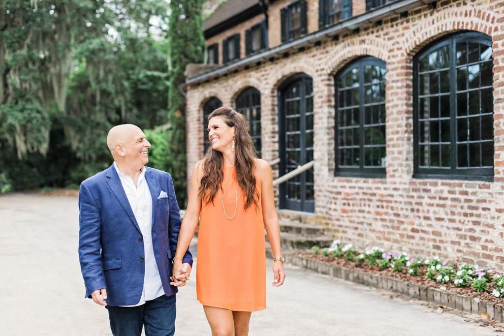 Couple holding hands at historic Middleton Place | Kaitlin Scott Photography