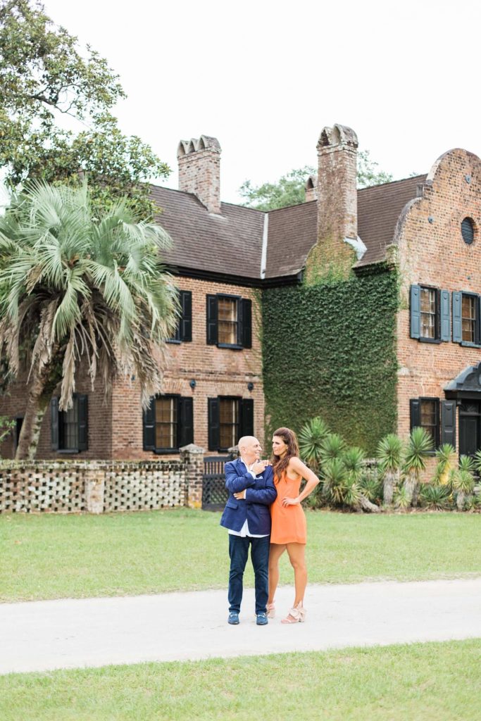 Engagement poses with personality at Middleton Place