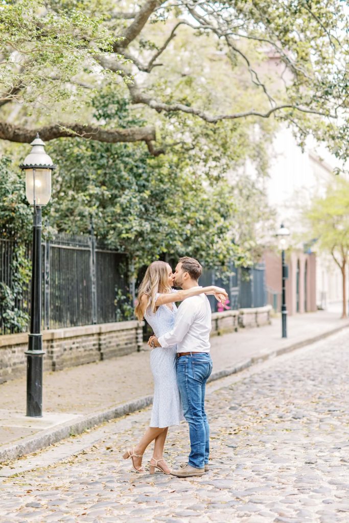 Romantic photos with your fiance on Charleston cobblestones